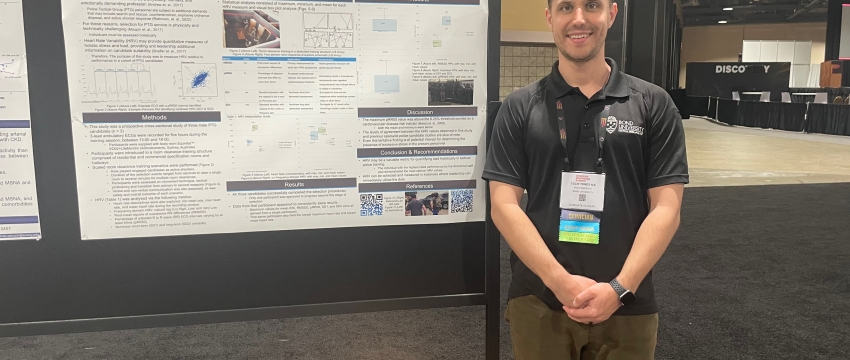 Colin Tomes presents his poster