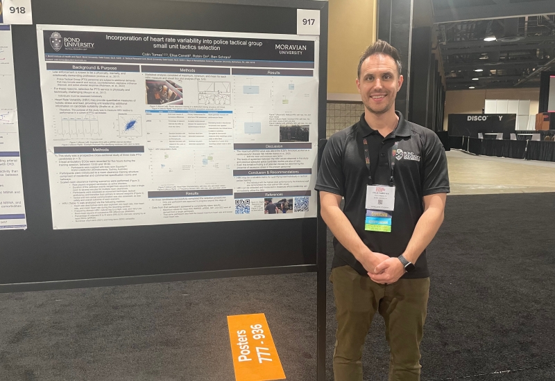 Colin Tomes presents his poster